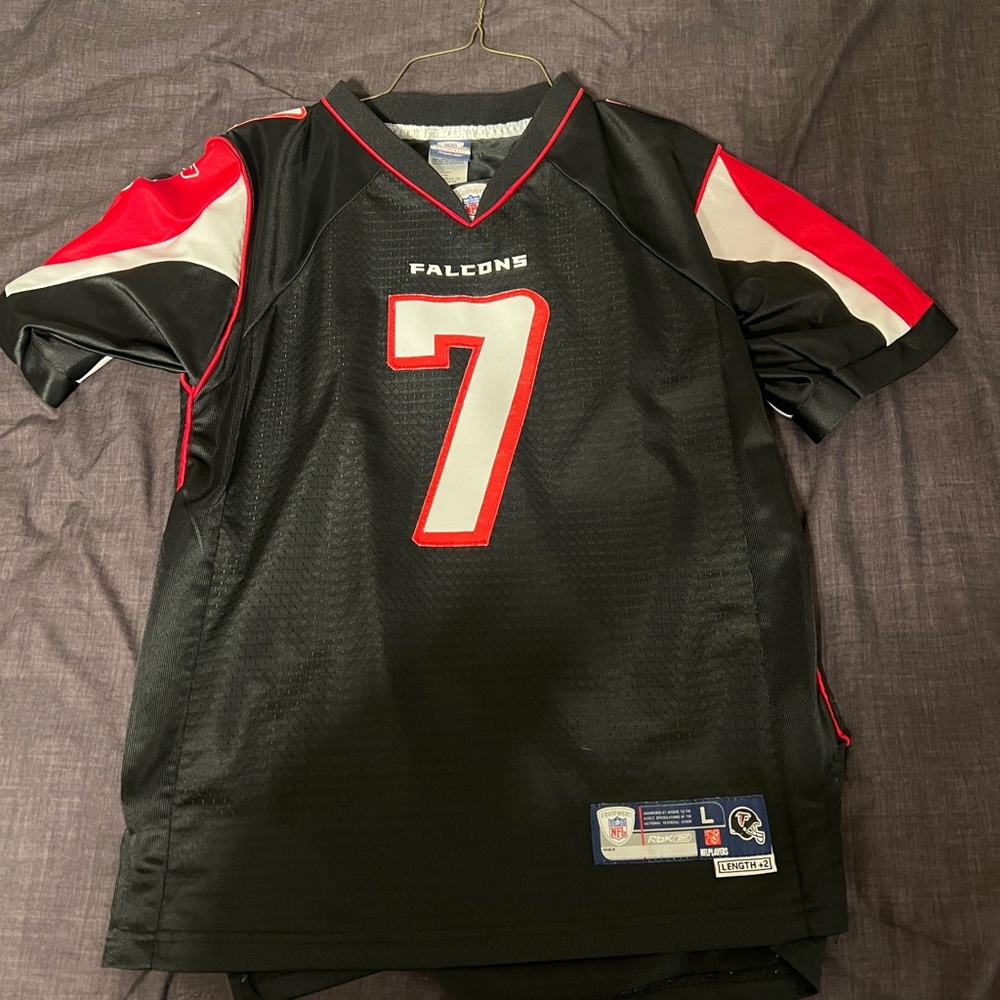 Men’s large Michael Vick jersey. Practically brand new.